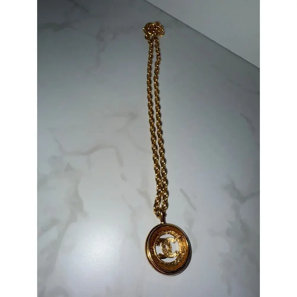 Chanel CC Sunburst Round Pendant Necklace - Gold-Tone